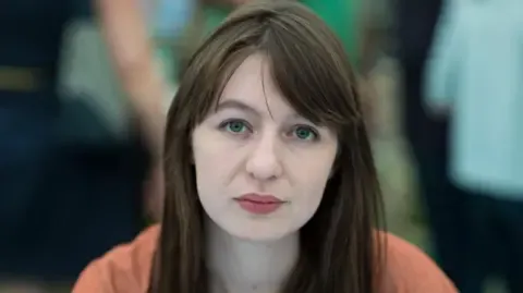 Irish author Sally Rooney declares she cannot travel to the UK over potential arrest